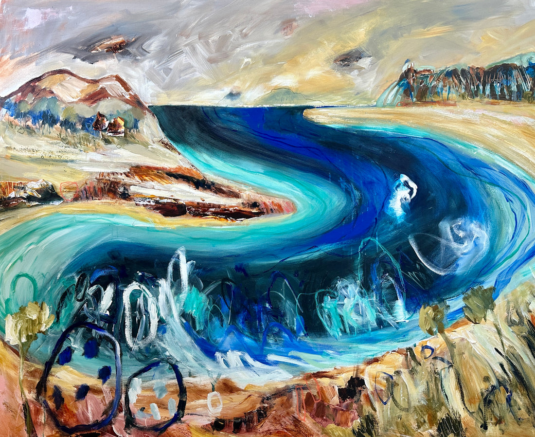 A blue sea with yellow sand and waves.