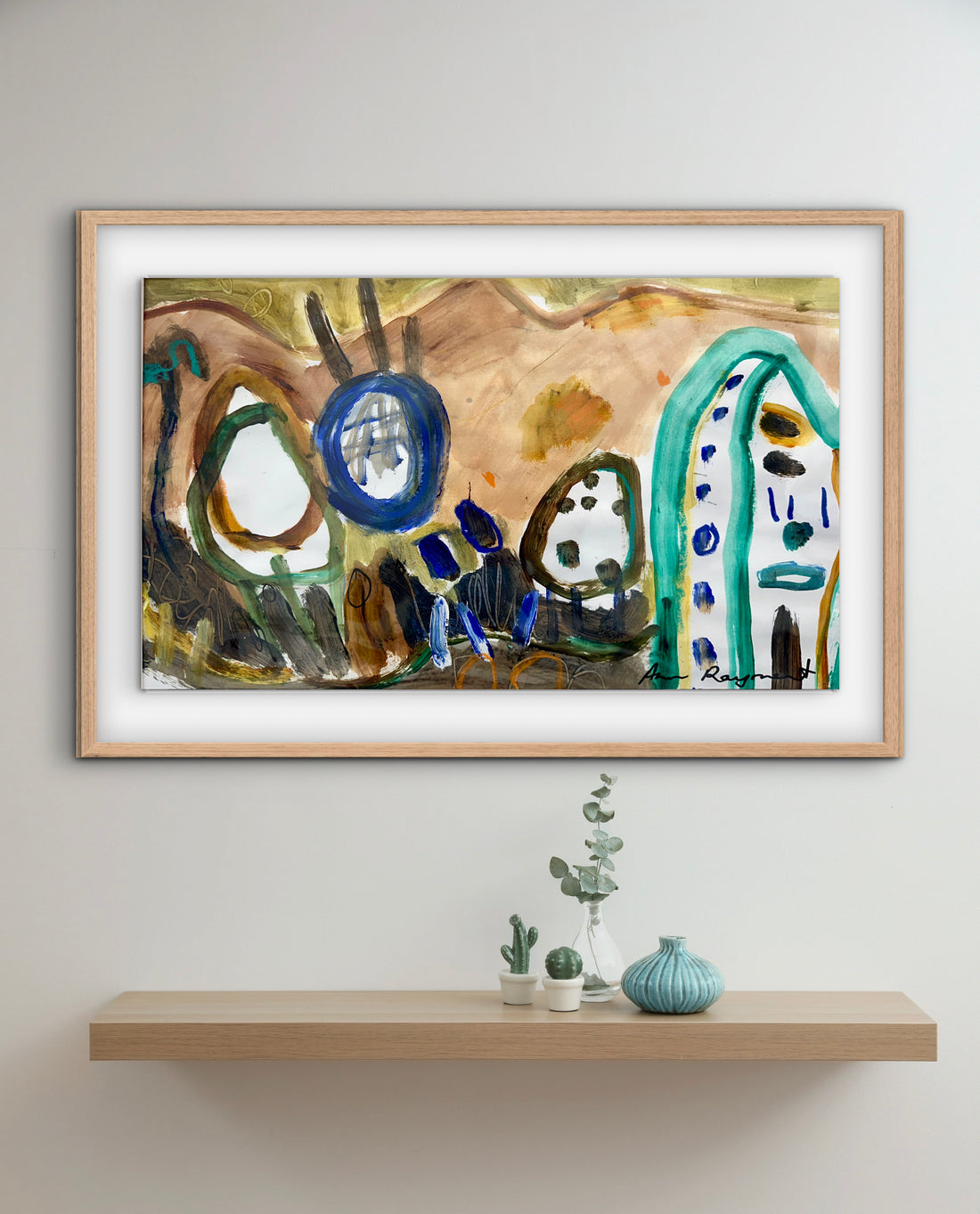 Abstract painting in a wooden frame on a wall above a shelf with decorative items.