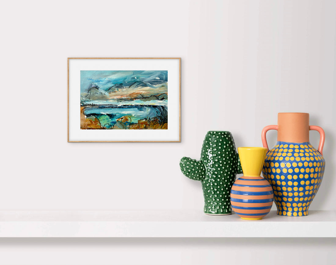Framed artwork on a wall with decorative vases below